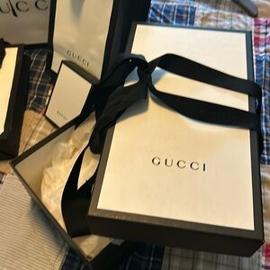 Multiple Gucci bags and three boxes assorted sizes